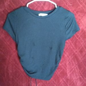 Black shirt with the back open with a tie string very cute